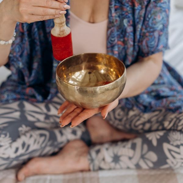 Close-up of a person in a calm meditative state during yoga.